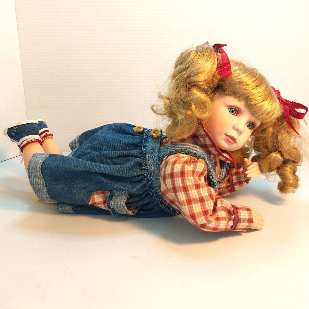 Princess House Porcelain Doll, laying on tummy